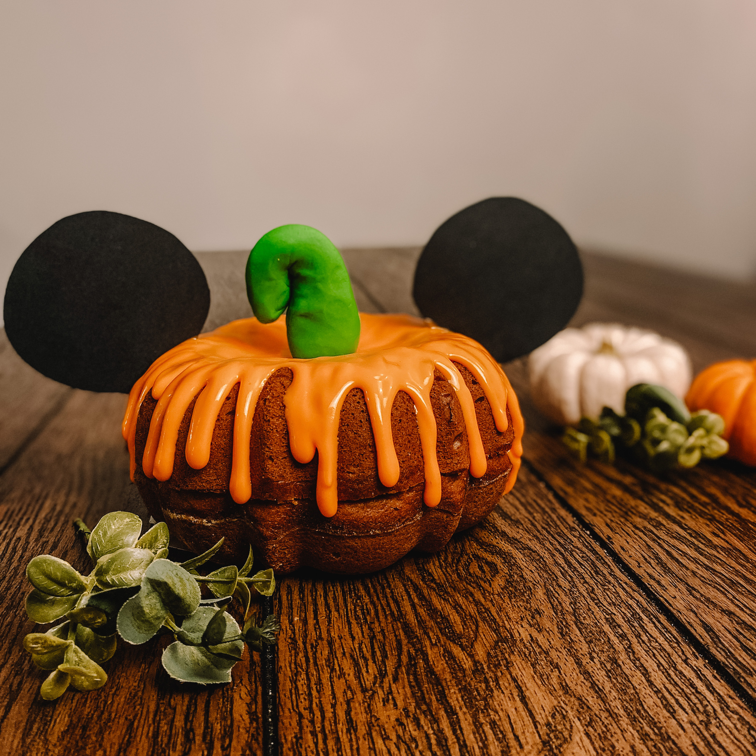 pumpkin spice mickey bundt-kin with cream cheese glaze