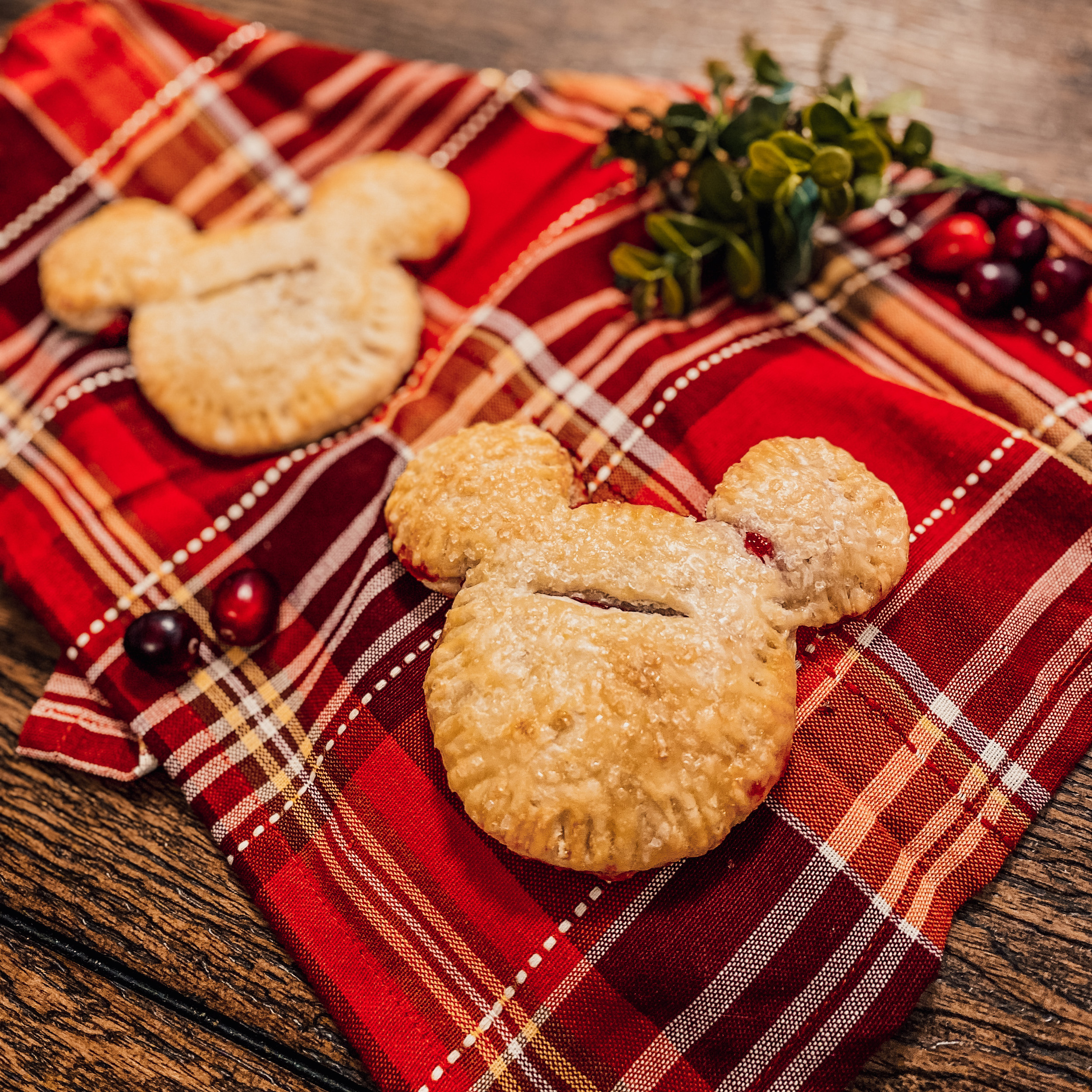 two cranberry mickey hand pies