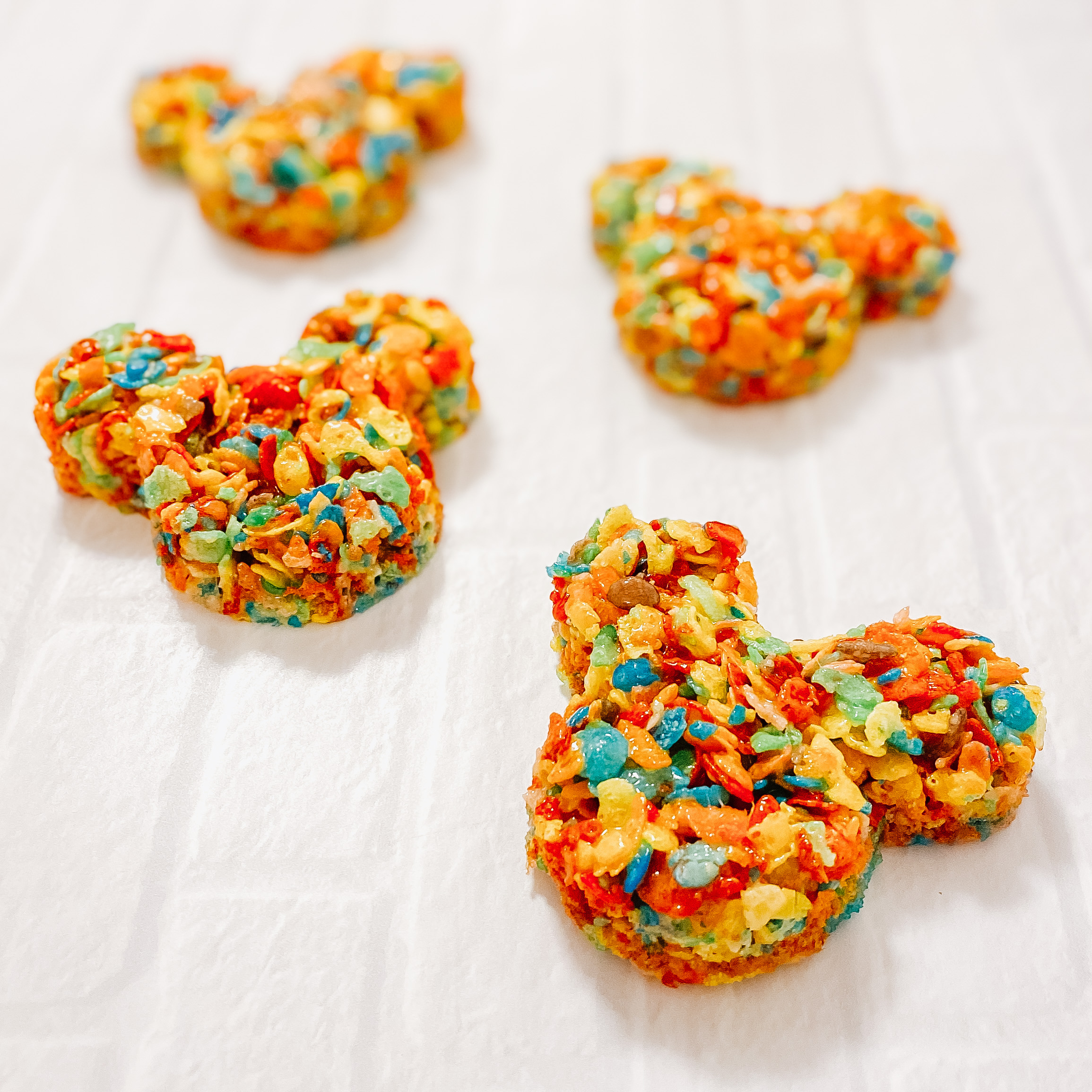 rainbow mickey krispies on a white background