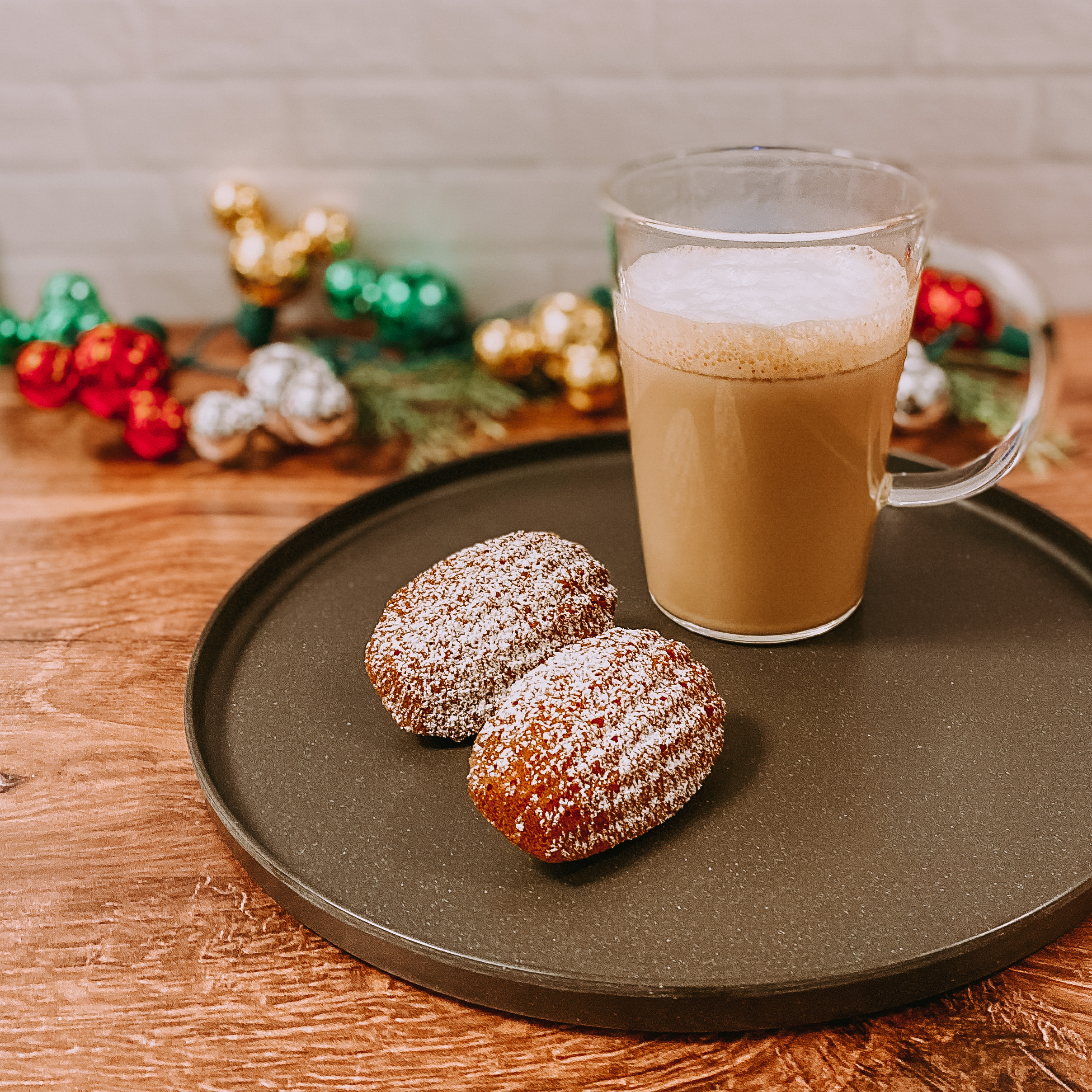 Caramel Pecan Chai Latte with two madeleines