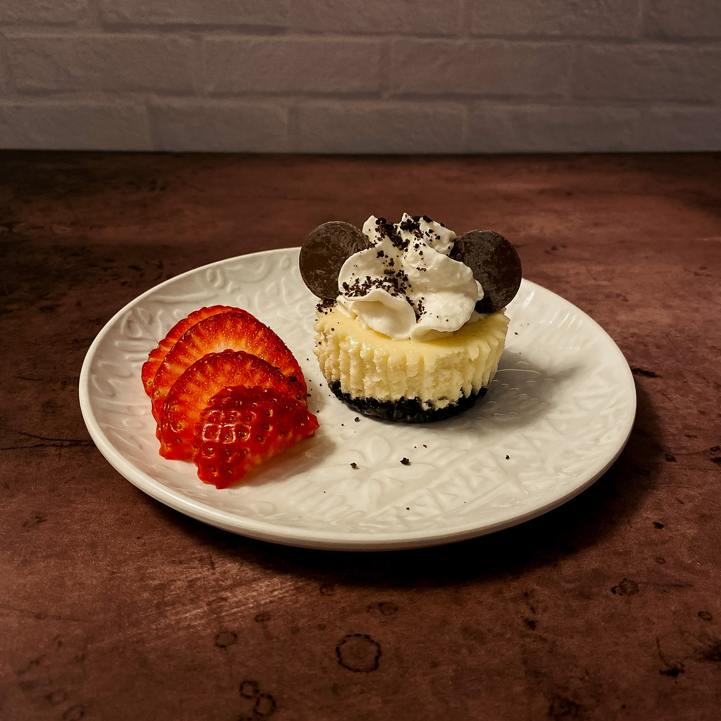 Mickey's Cookies & Cream Cheesecakes (cheesecake with whipped cream and chocolate Mickey ears)