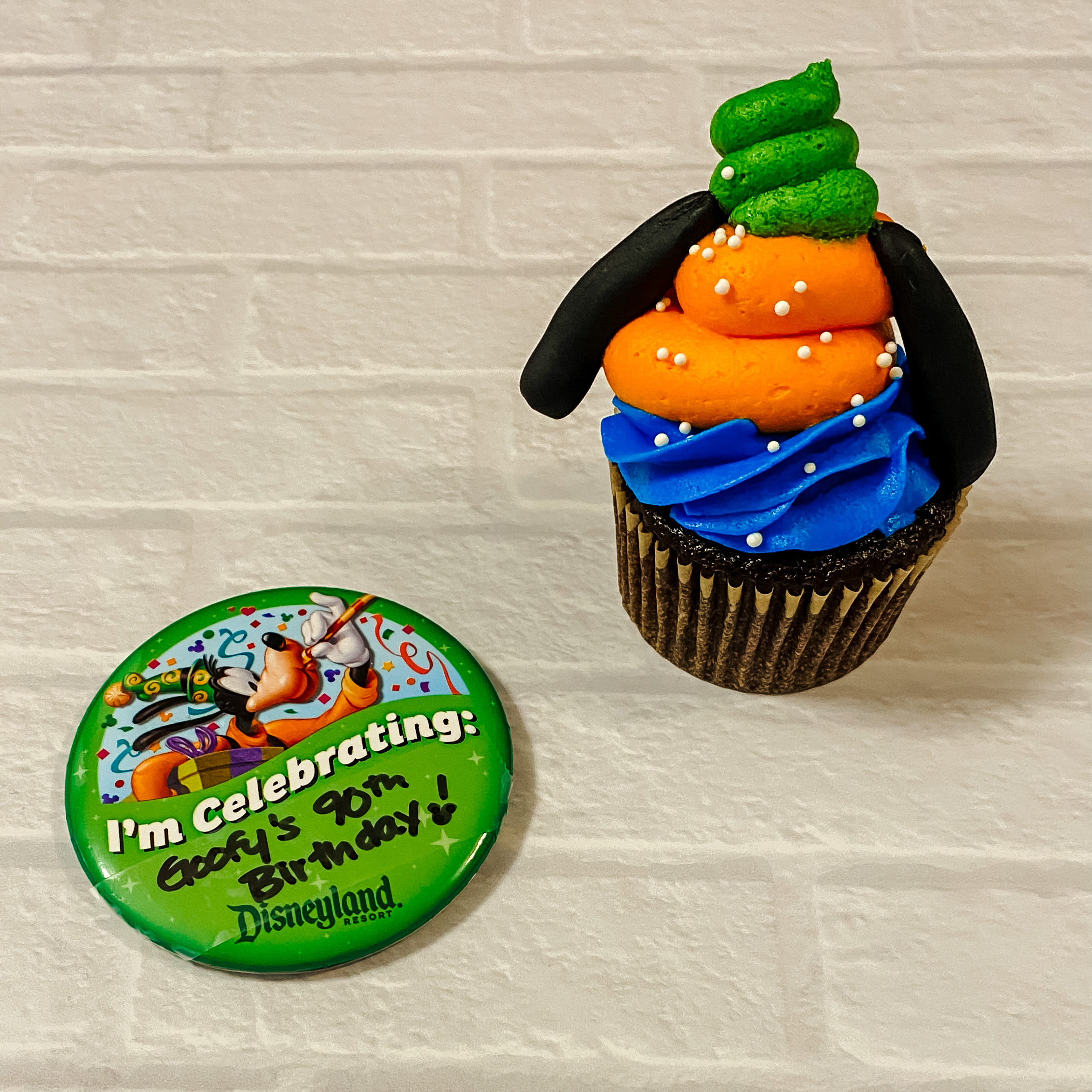 Goofy Cupcakes (chocolate cupcakes with blue, orange, and green frosting with black fondant ears)