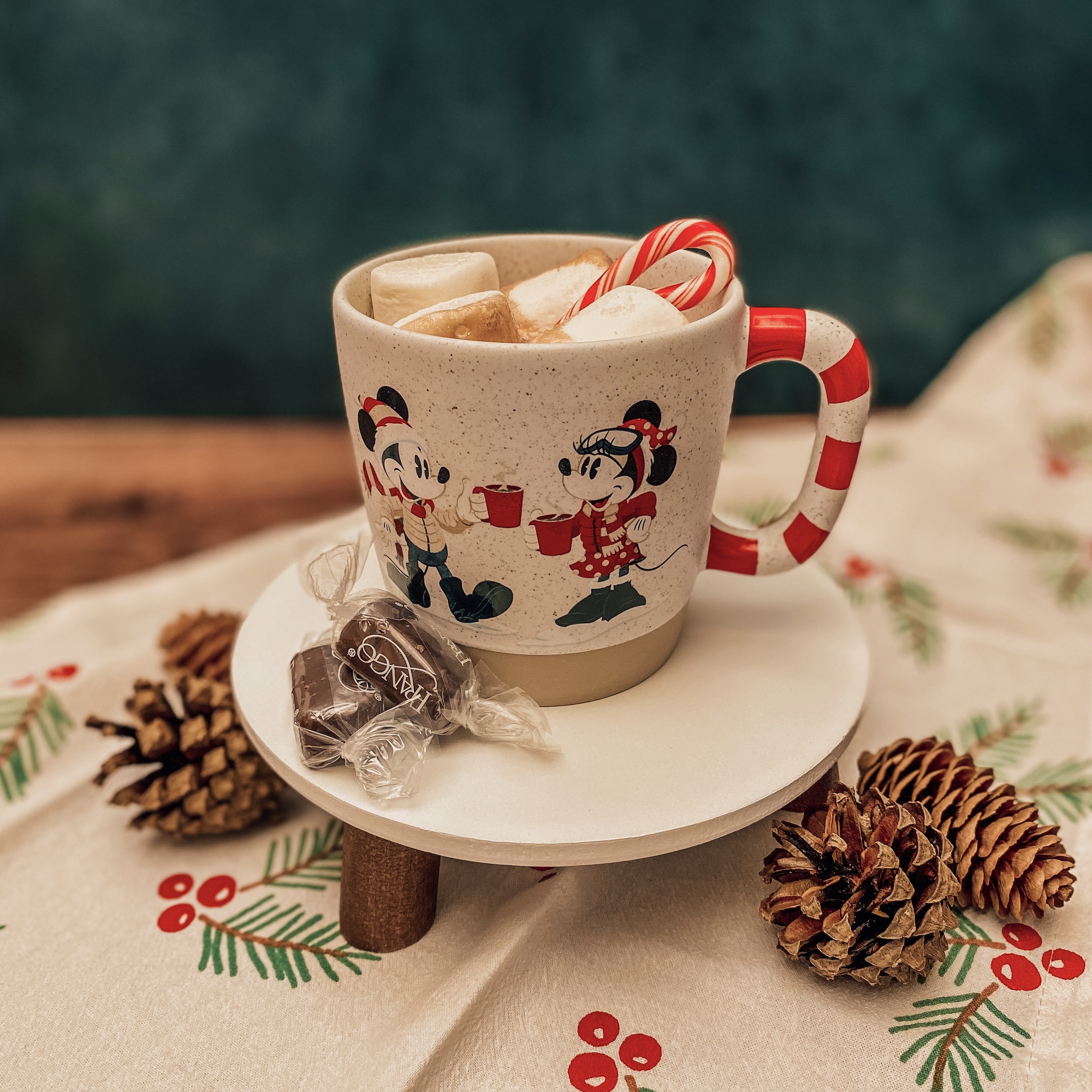 Mug with Mickey and Minnie Mouse filled with peppermint hot cocoa and marshmallows