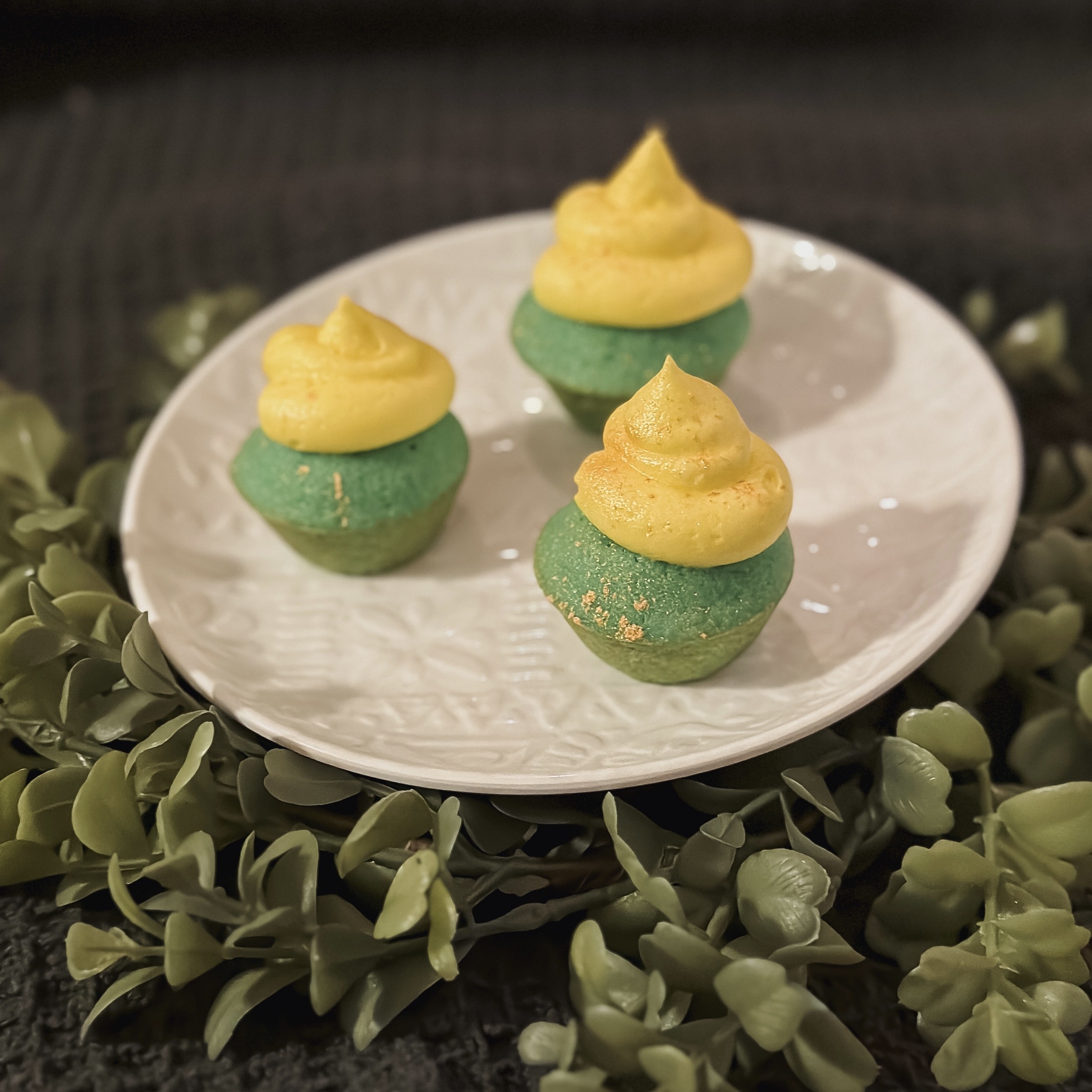 Tinkerbell Cupcakes (mini green vanilla cupcakes with yellow lemon frosting and edible gold dust)