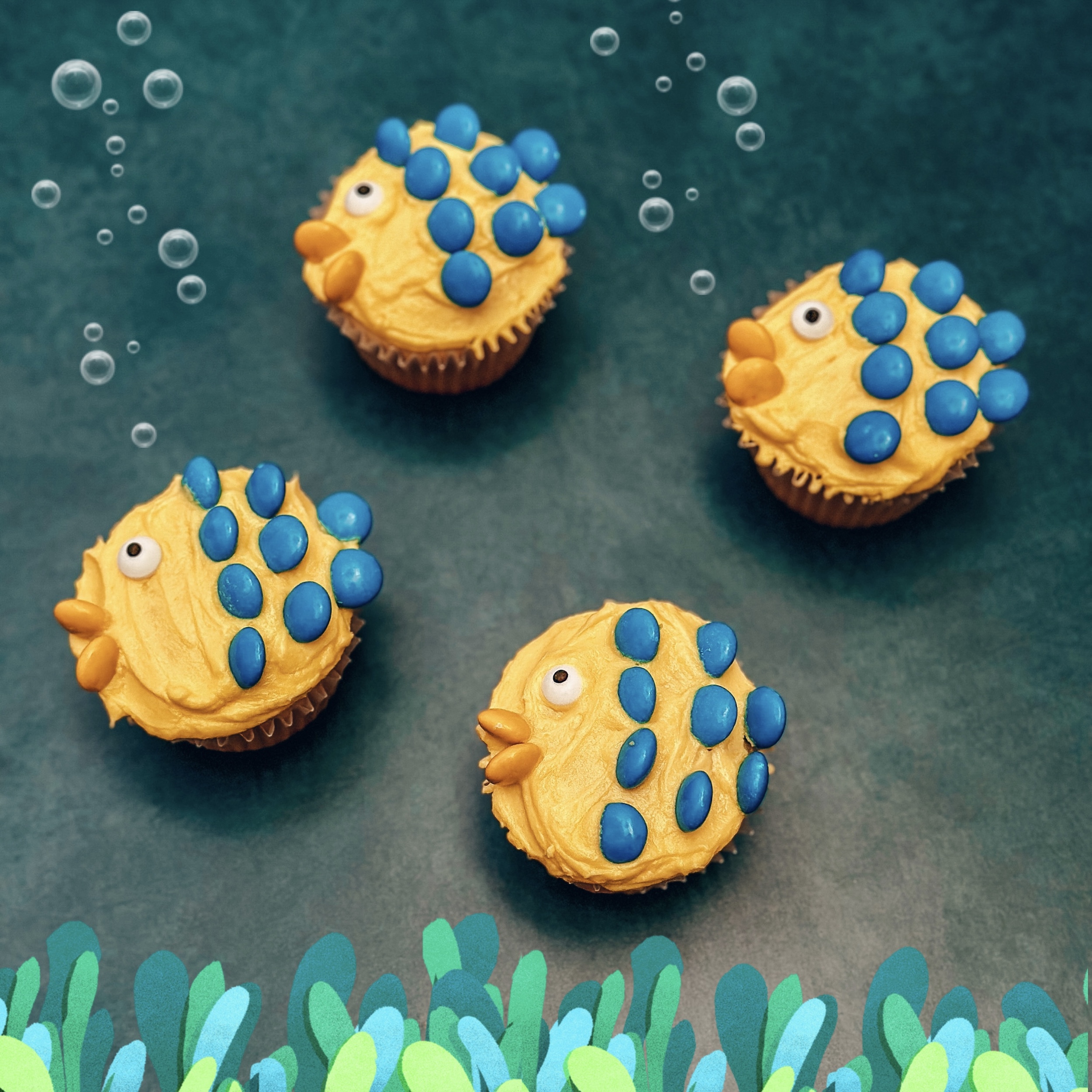 Flounder Cupcakes (vanilla cupcakes with yellow frosting and blue M&M scales)