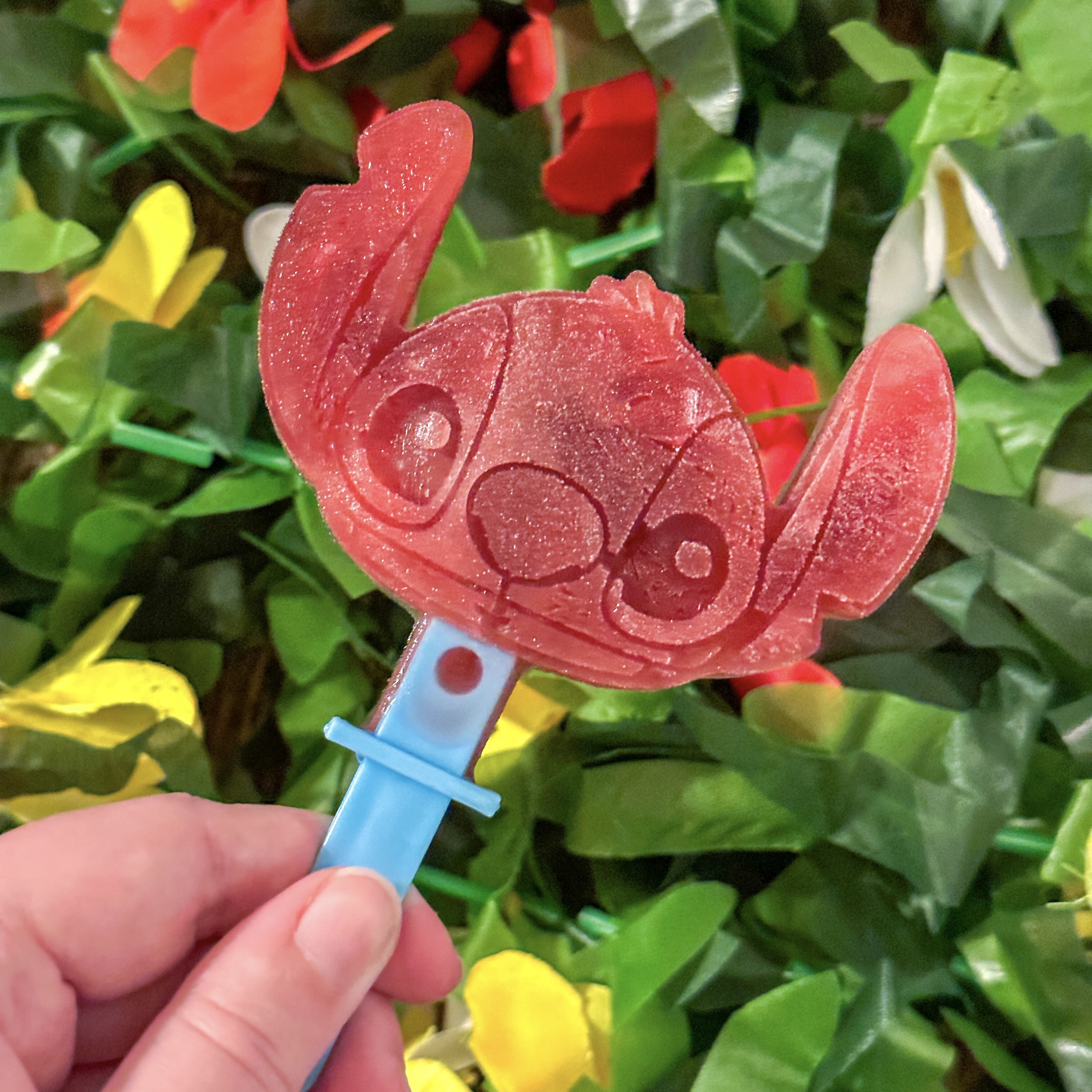 Stitch Juice Pops (a Stitch shaped juice pop against a flower background)