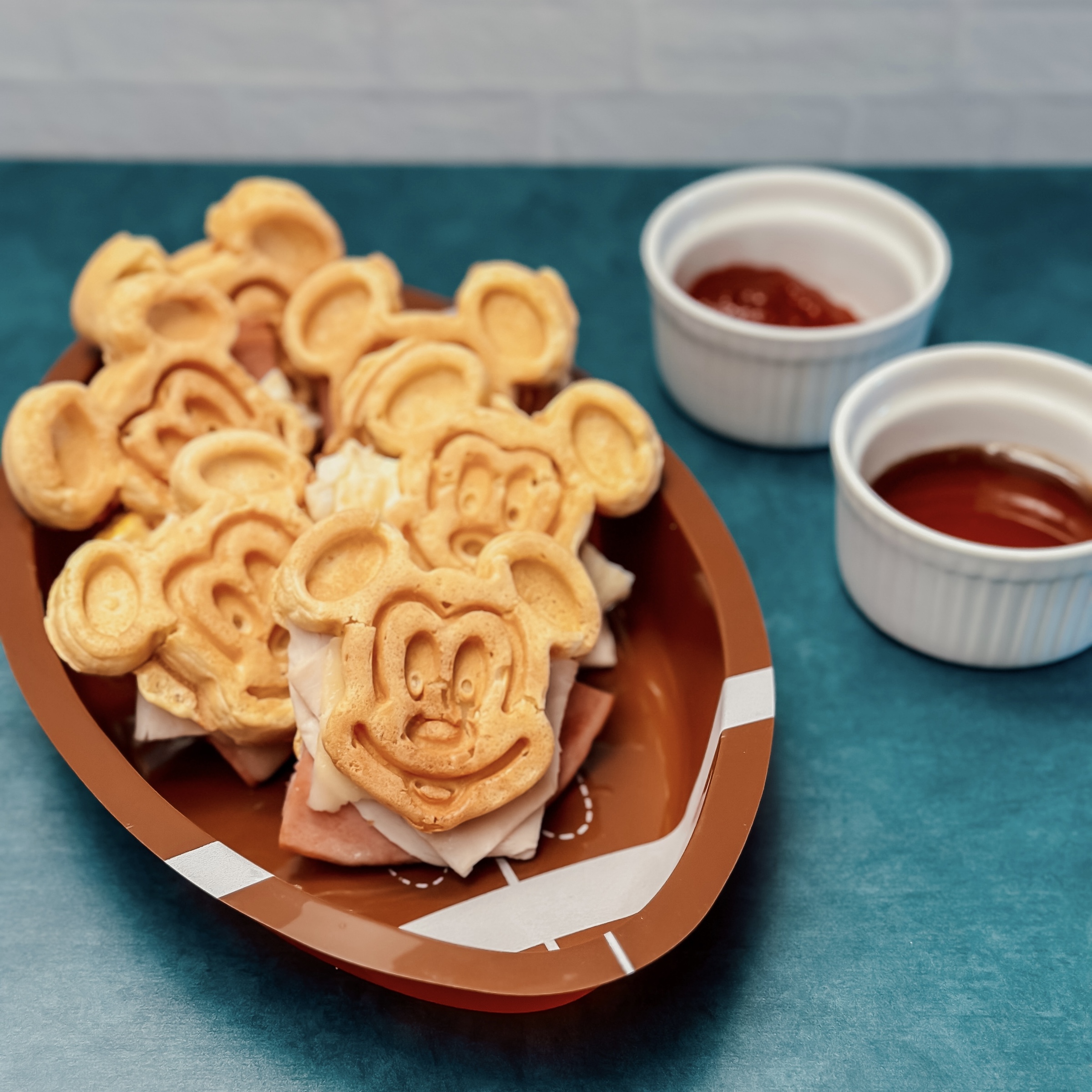 Mickey Waffle Cristos (Mickey shaped waffle sandwiches with ham, turkey, and swiss cheese)