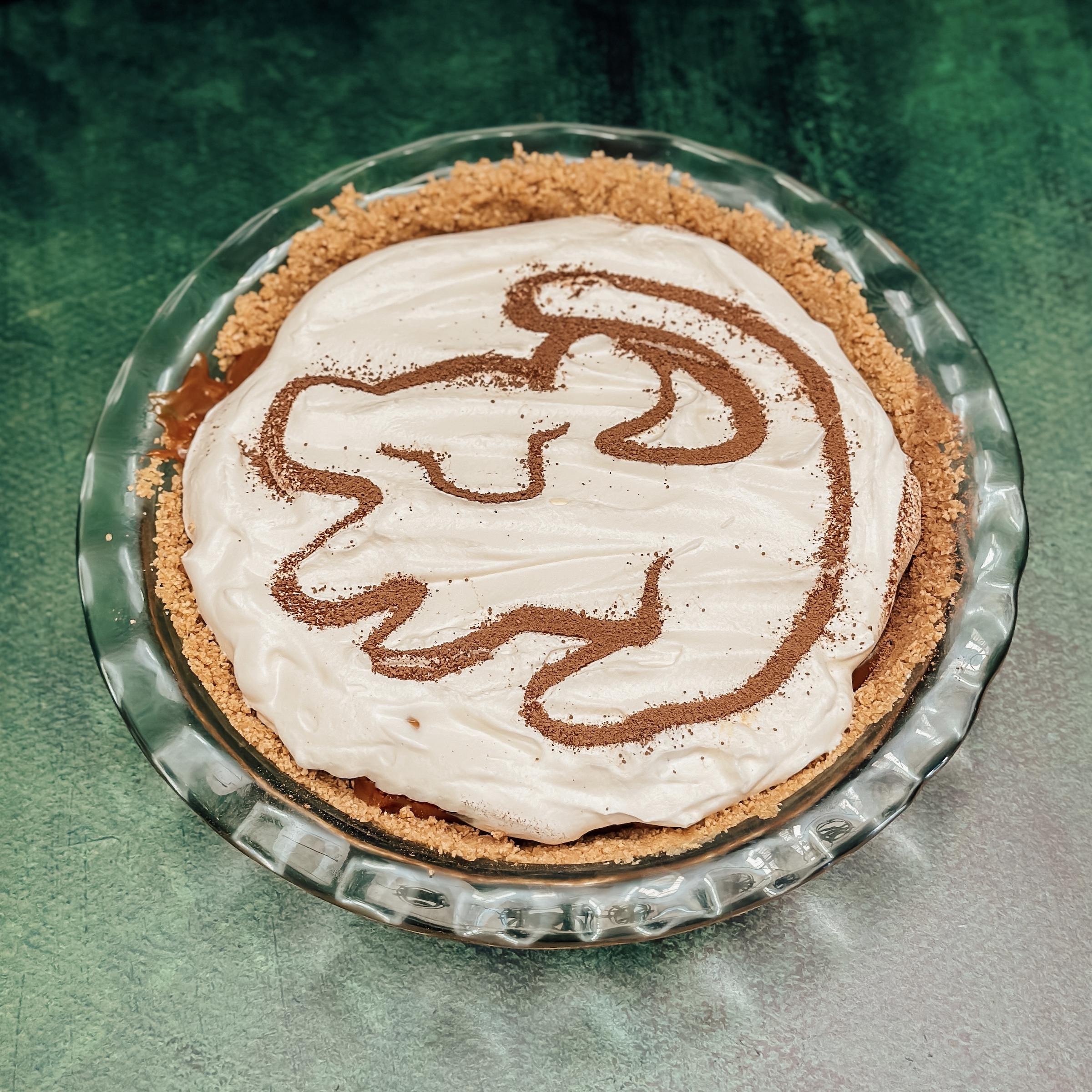 Rafiki's Squash Banana Pie (Banoffee Pie with Simba design)